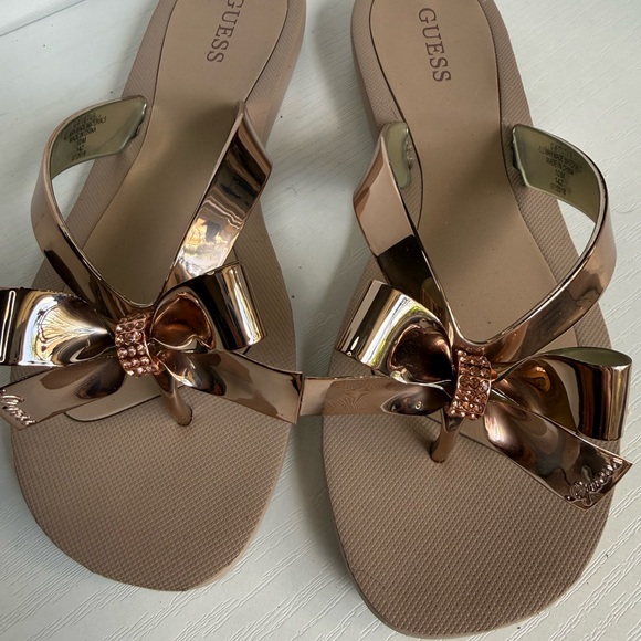 Guess Shoes - GUESS Metallic Rose Gold Bow Thong Sandals with Nude Footbed